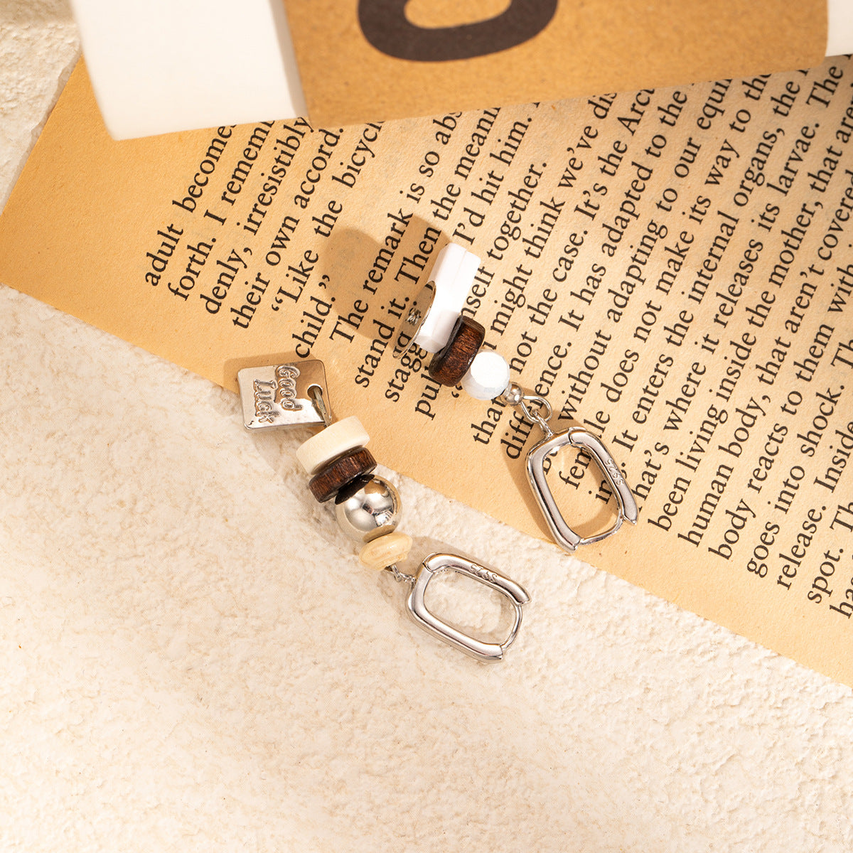 Wholesale silver needle stacked asymmetrical earrings