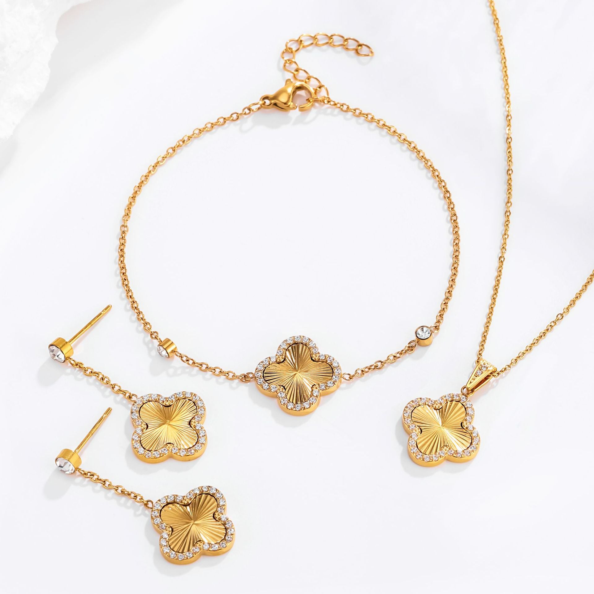 Wholesale Stainless steel zircon-set four-leaf clover necklace earrings,  and bracelet set