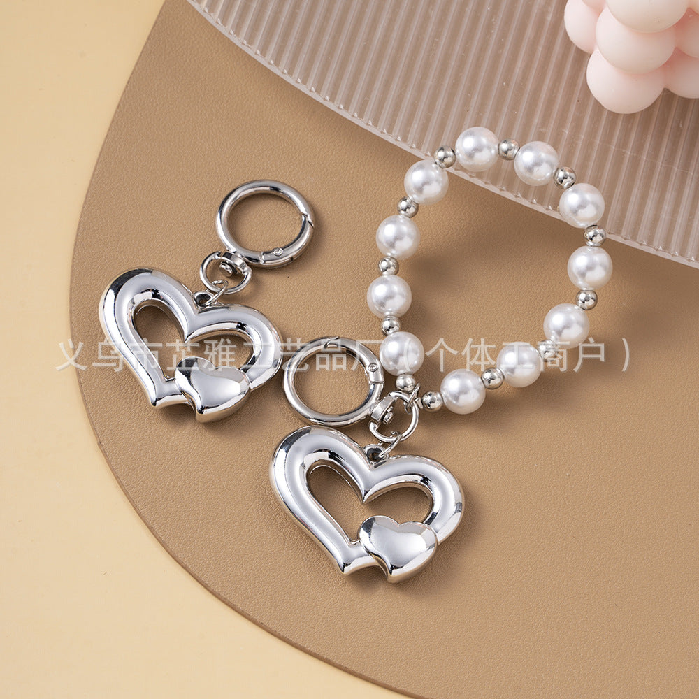 Wholesale Light Luxury Resin Alloy Peach Heart Pearl Keychains