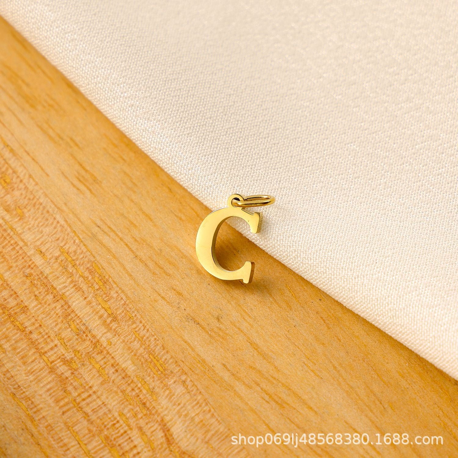 Wholesale Titanium steel letter pendant