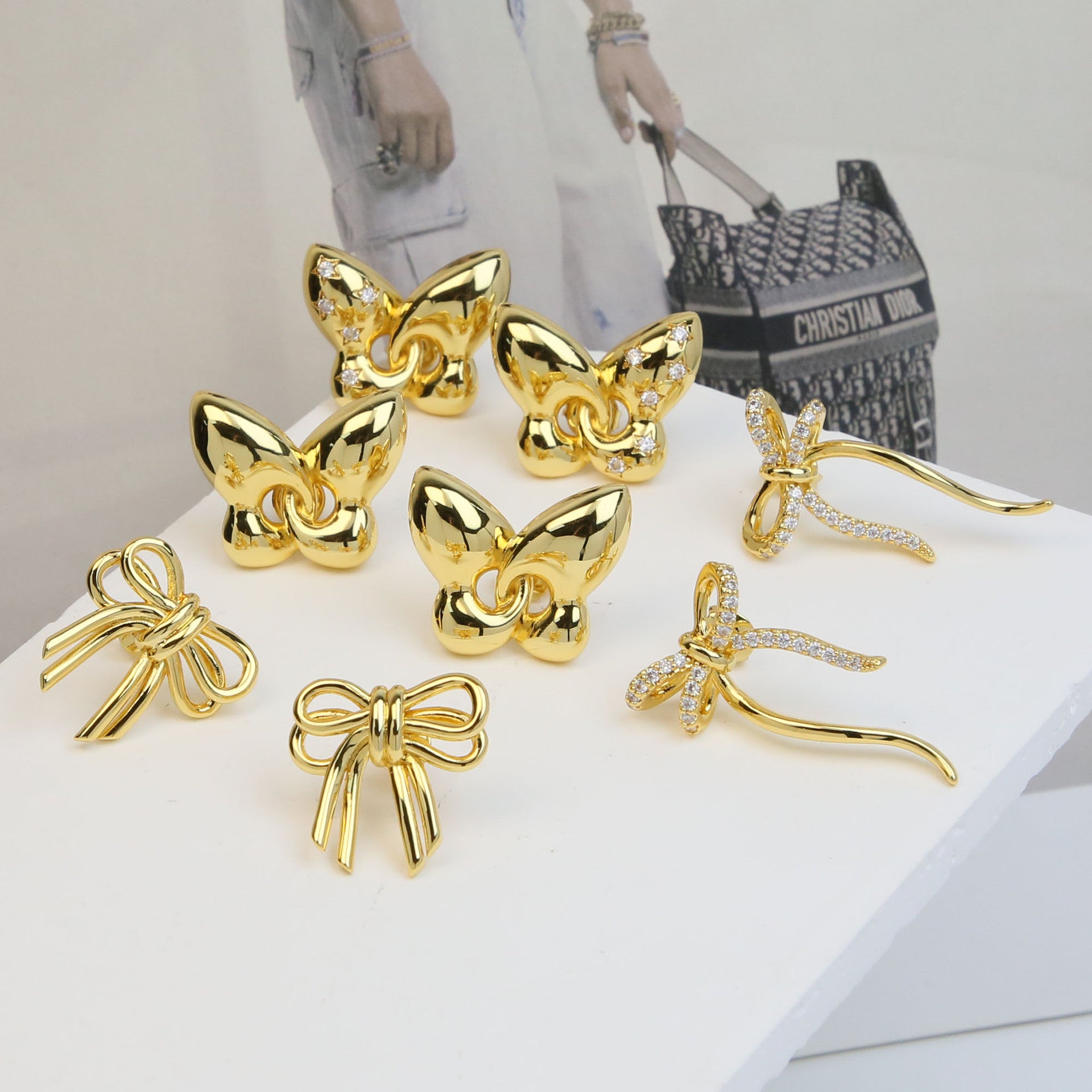 Wholesale 18k gold smooth high sense bow earrings