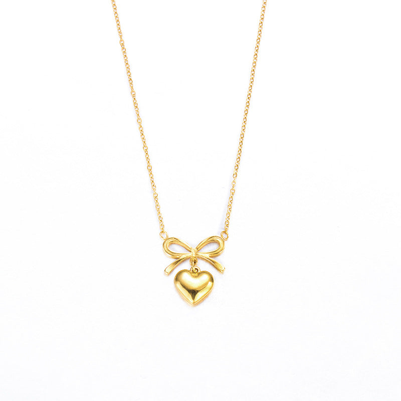 Wholesale  Stainless Steel Hollow Heart-shaped Love Bow Pendant Necklace
