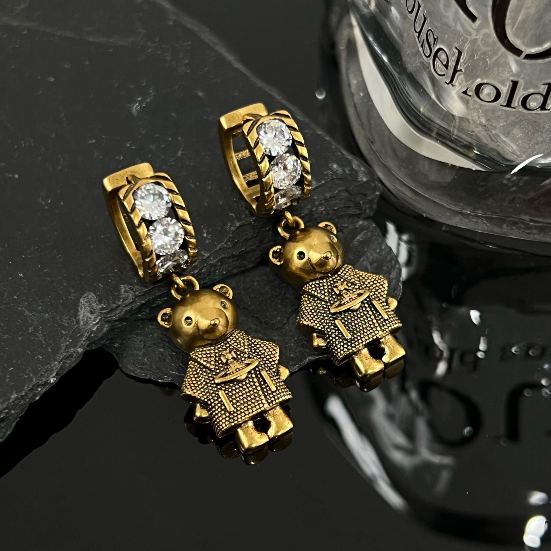 Wholesale Ancient Gold Saturn Bear Ear Buckle Light Luxury Earrings