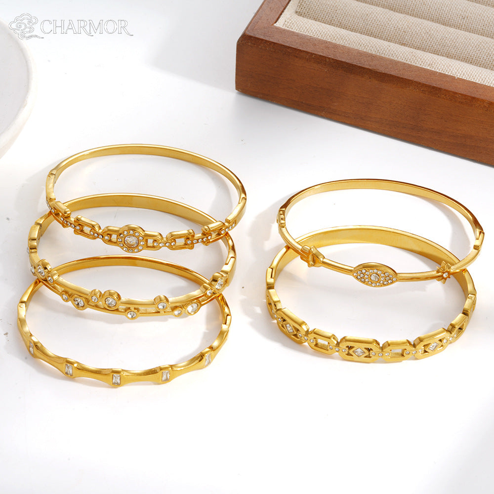 Wholesale Titanium Steel Geometric Starburst Bangle with Inlaid Diamonds