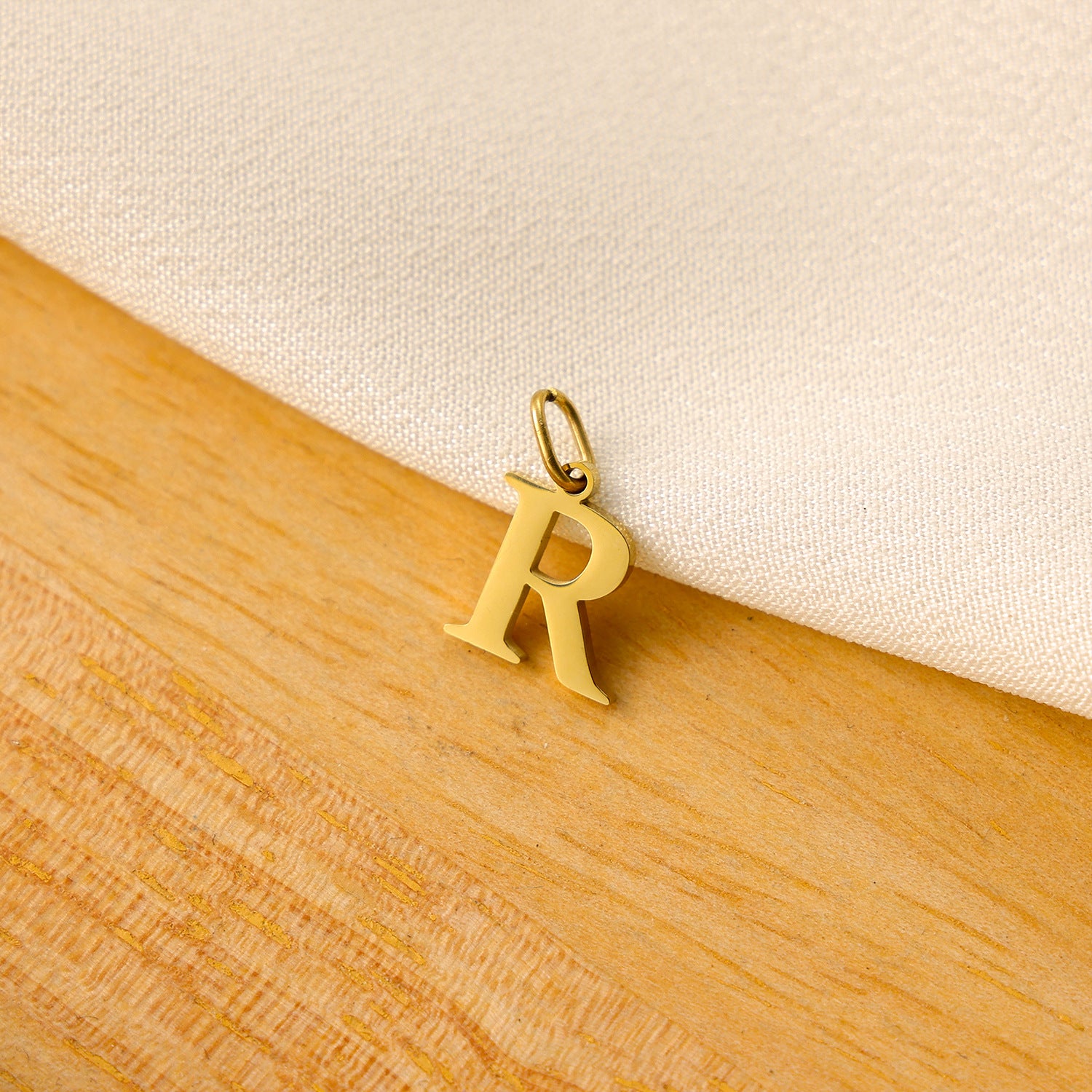 Wholesale Titanium steel letter pendant