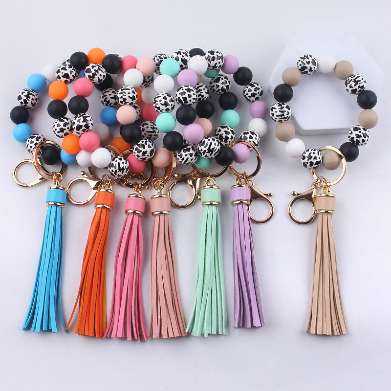 Wholesale leather PU tassel silicone beads wooden beads DIY  bracelet keychain
