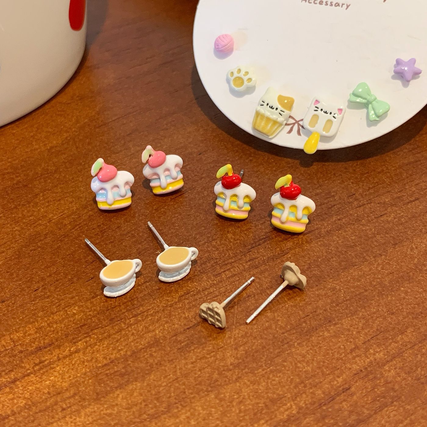 Wholesale Small exquisite and cute earring set asymmetrical dopamine silver needle earrings