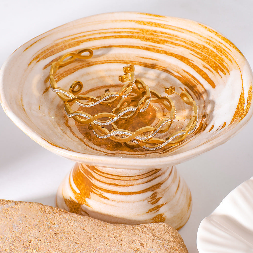 Großhandelskreis C-formed Twist geflochtener Haken verpackter Zirkon glänzender Edelstahlohrringe