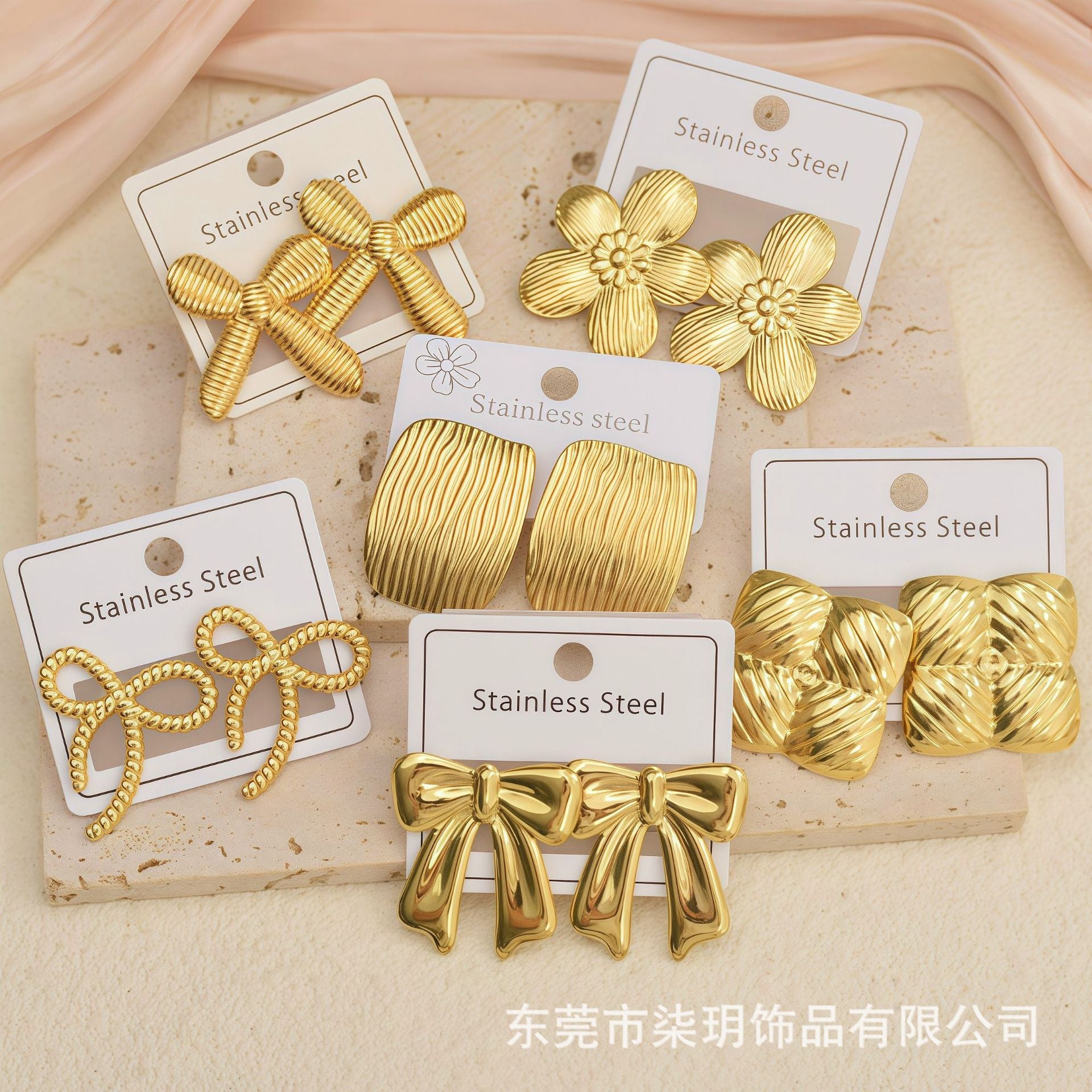 Wholesale Stainless Steel Unique Bow Irregular Stud Earrings