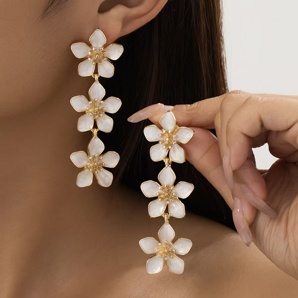 Wholesale sweet and elegant colorful drip flower earrings for women  retro long tassel flower earrings