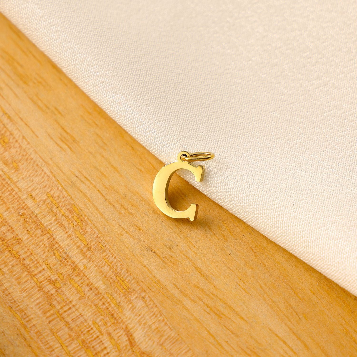 Wholesale Titanium steel letter pendant