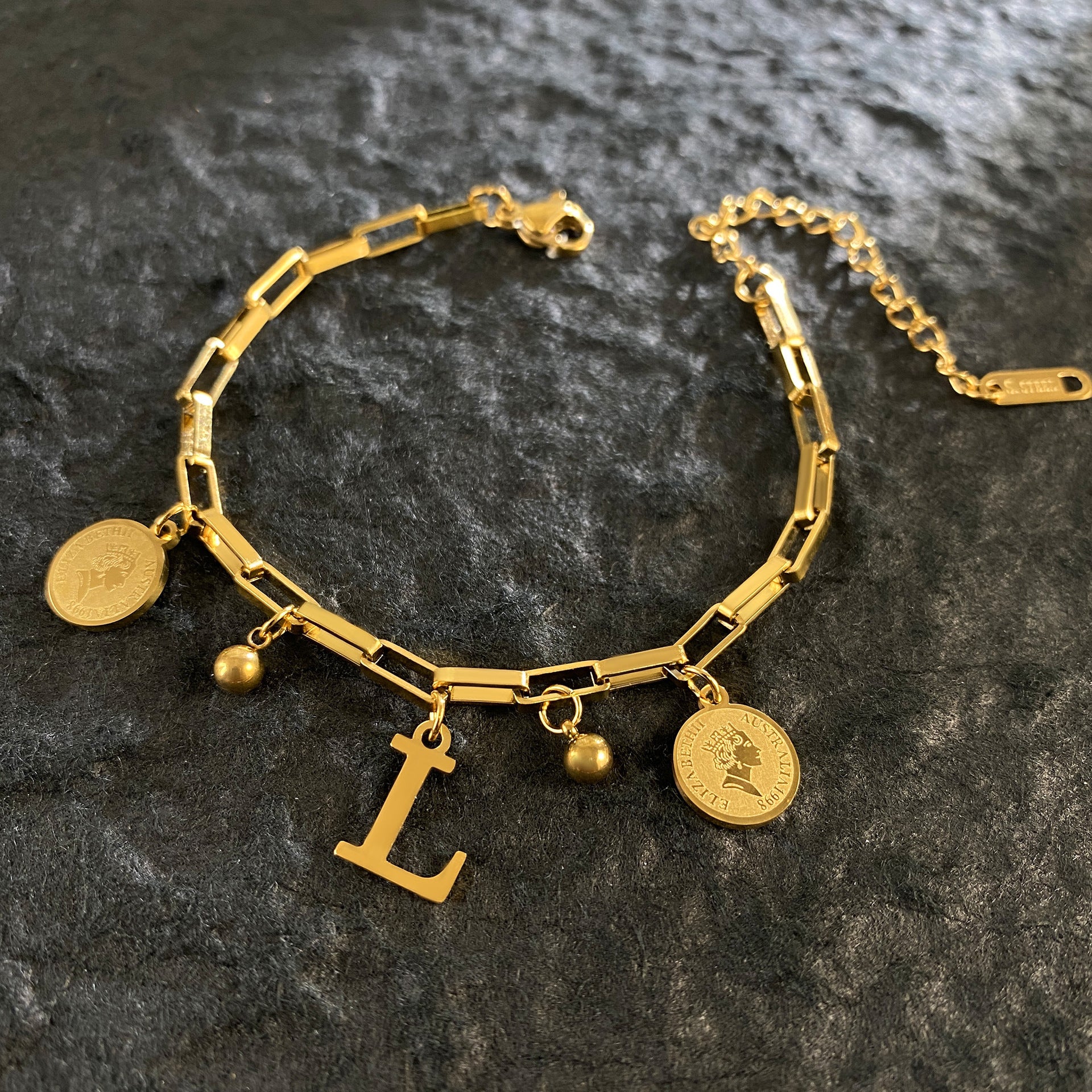 Wholesale Titanium Steel 18K Gold Plated Queen's Head Letter Bracelet ACC-BT-YuXun007