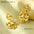 Wholesale  18k gold  petal pearl does not fade stainless steel earrings