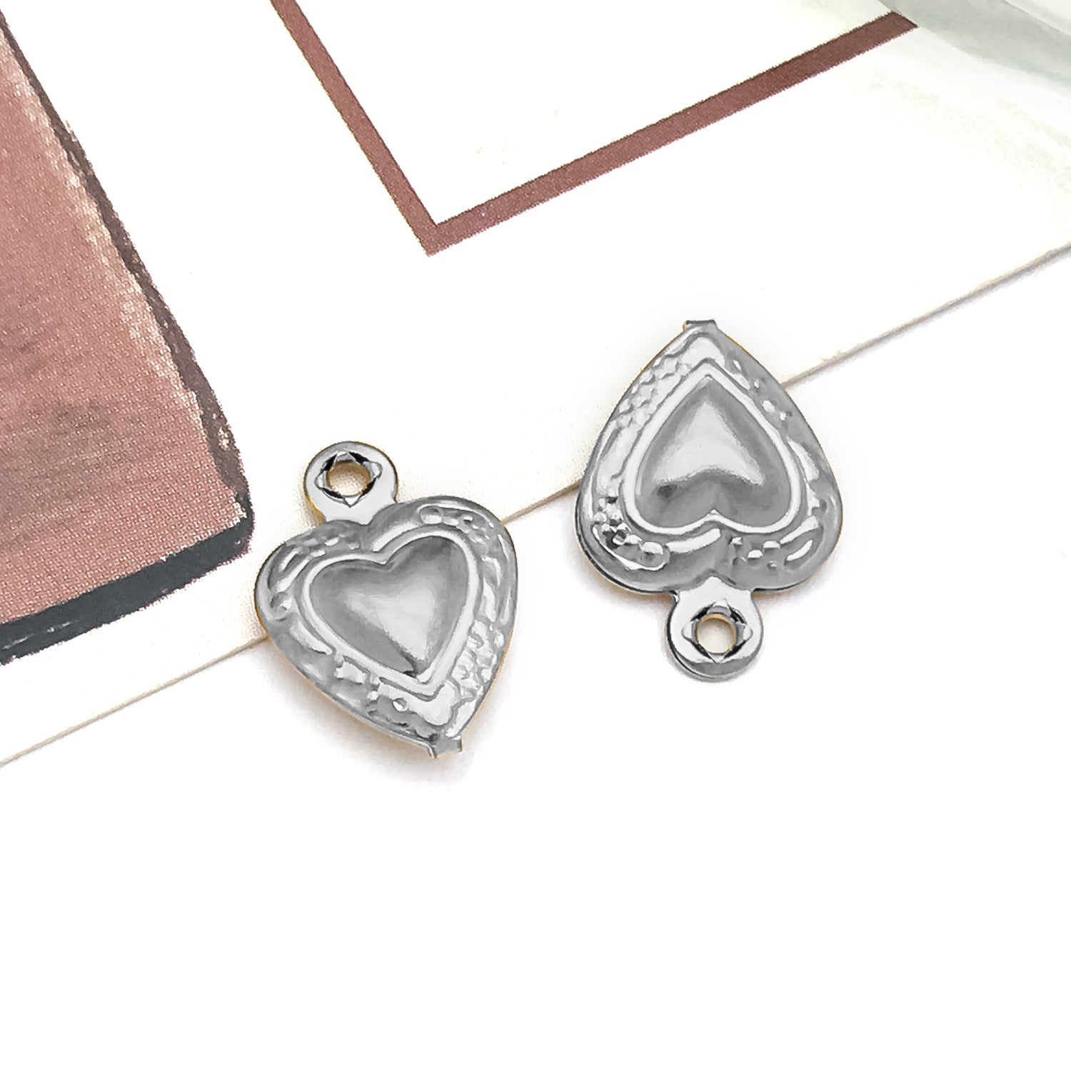 Wholesale Stainless steel vacuum plated hollow angel heart fruit  Charms