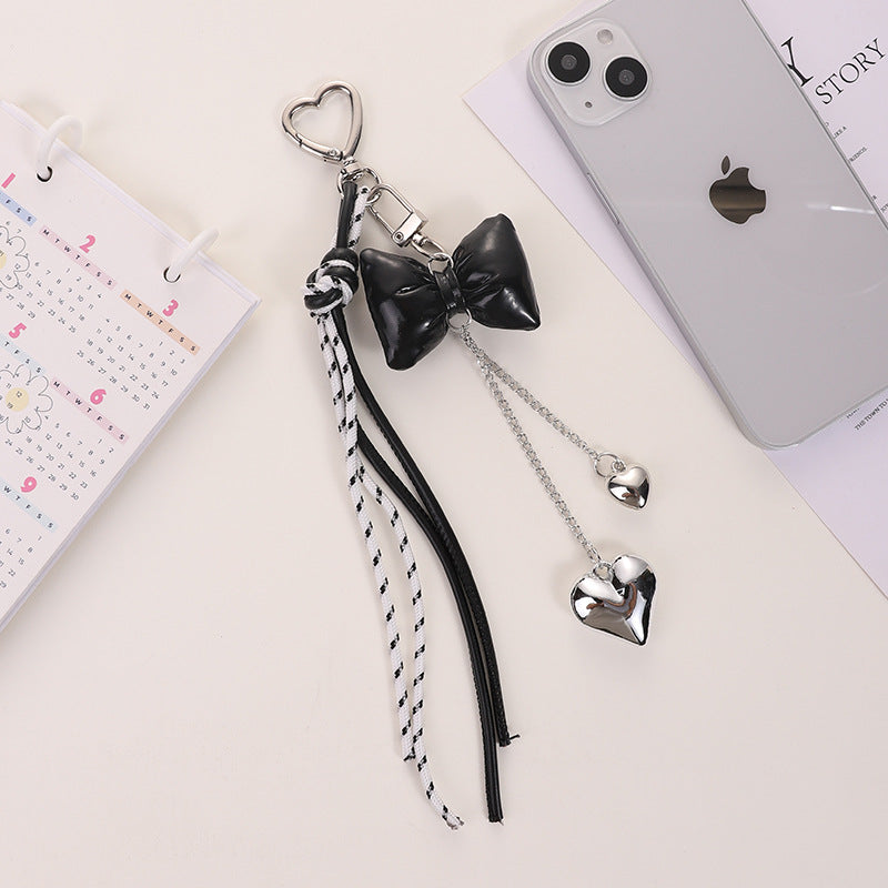 Wholesale Leather cord bow tassel keychain