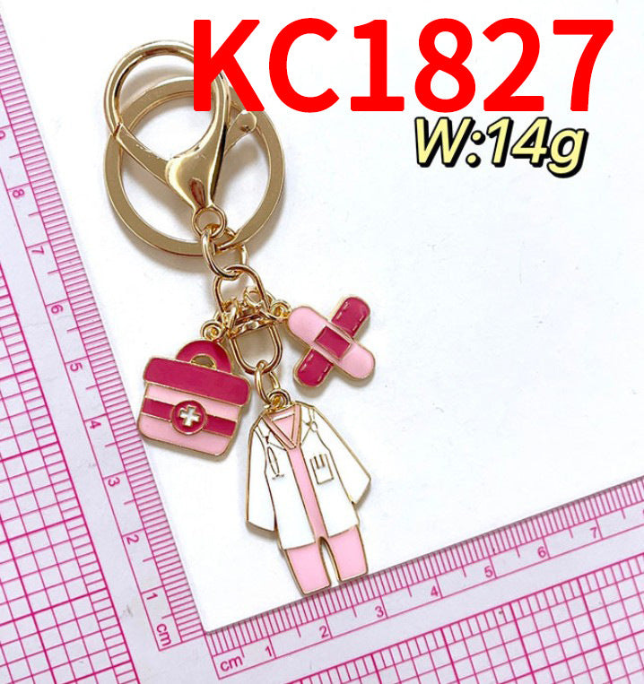 Wholesale Classic nurse cap thermometer pill mask heartbeat nurse suit zinc alloy keychain
