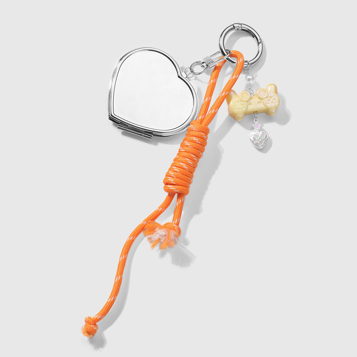 Wholesale Zinc alloy and leather boxing glove heart-shaped double-sided mirror keychain