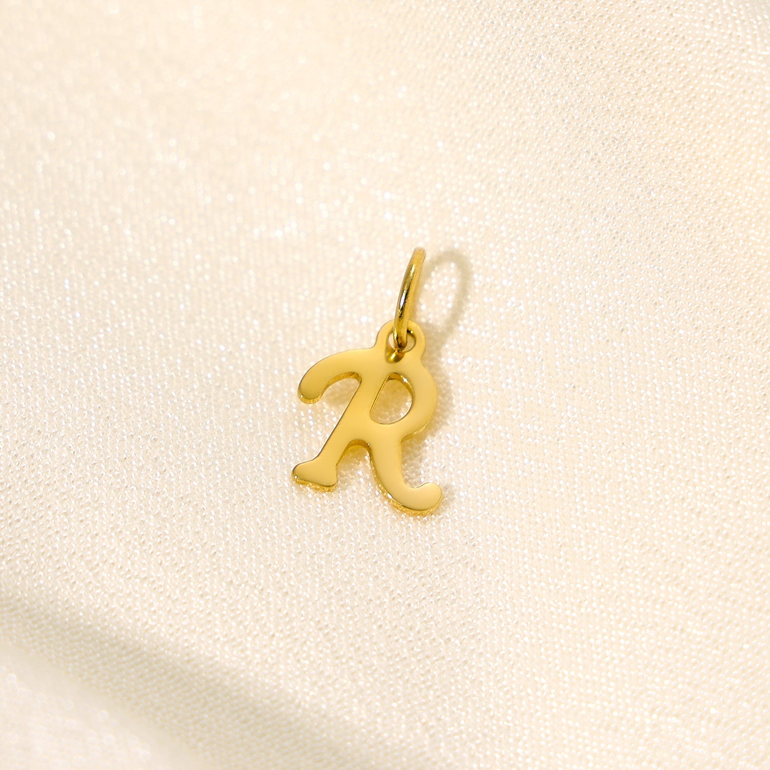 Wholesale 26 English letters stainless steel letter pendant