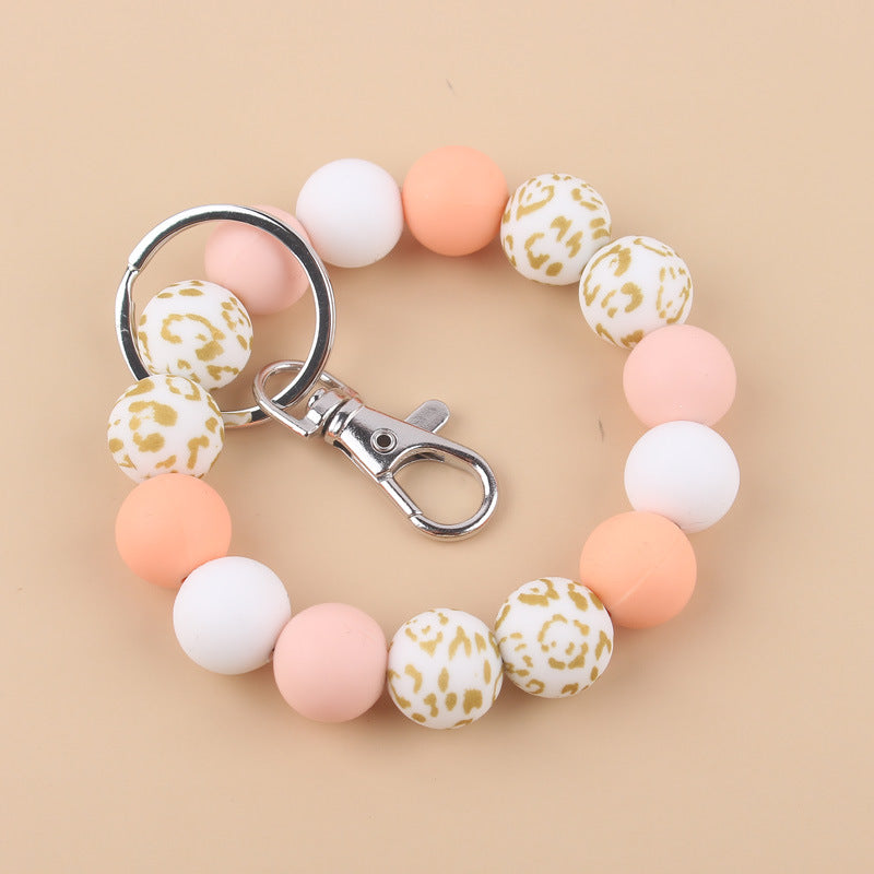 Wholesale Cow Pattern Sunflower Pattern Silicone Beaded Wrist Keychain ACC-KC-GuangTian024
