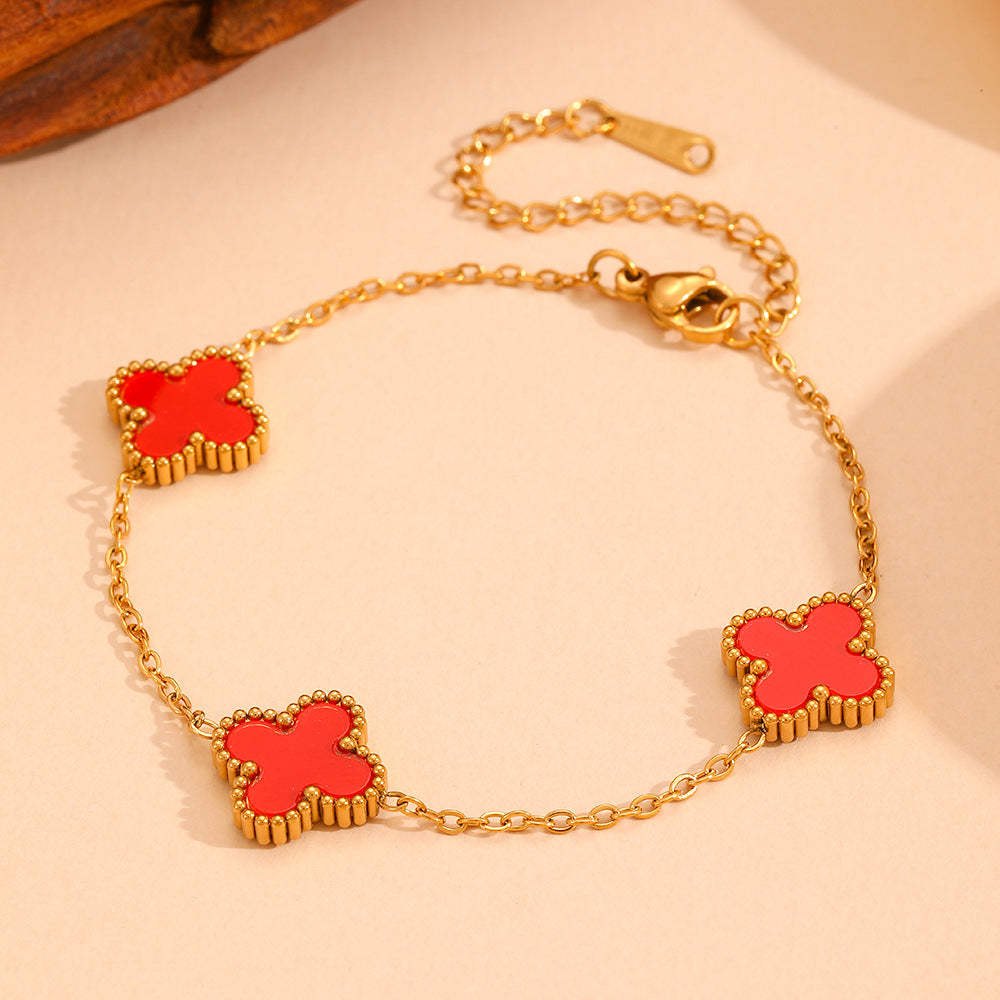 Wholesale Fashion stainless steel three four-leaf flower jewelry new titanium steel does not fade small flower jewelry suit