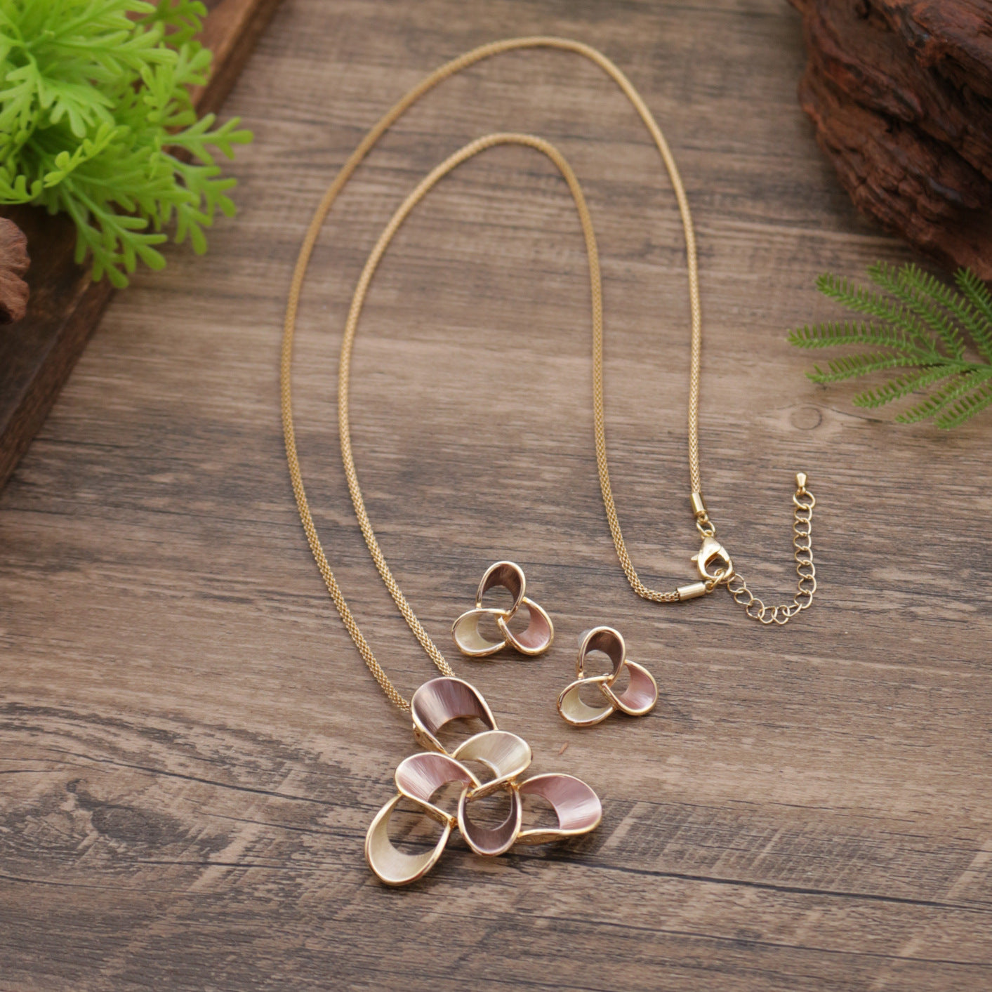 Wholesale  enamel hollow geometric flower stud earrings long pendant suit