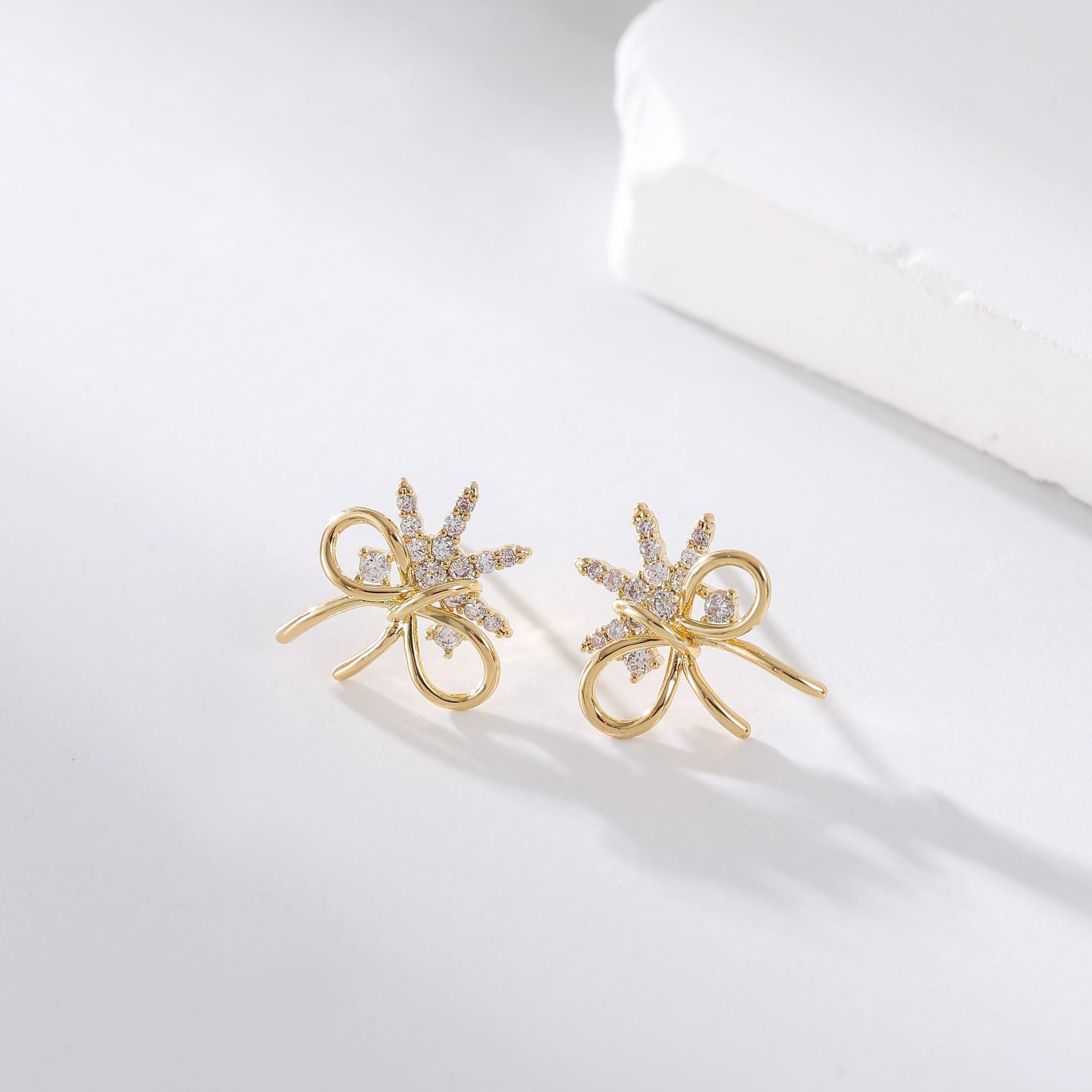 Wholesale Metal Bow Tassel Earrings