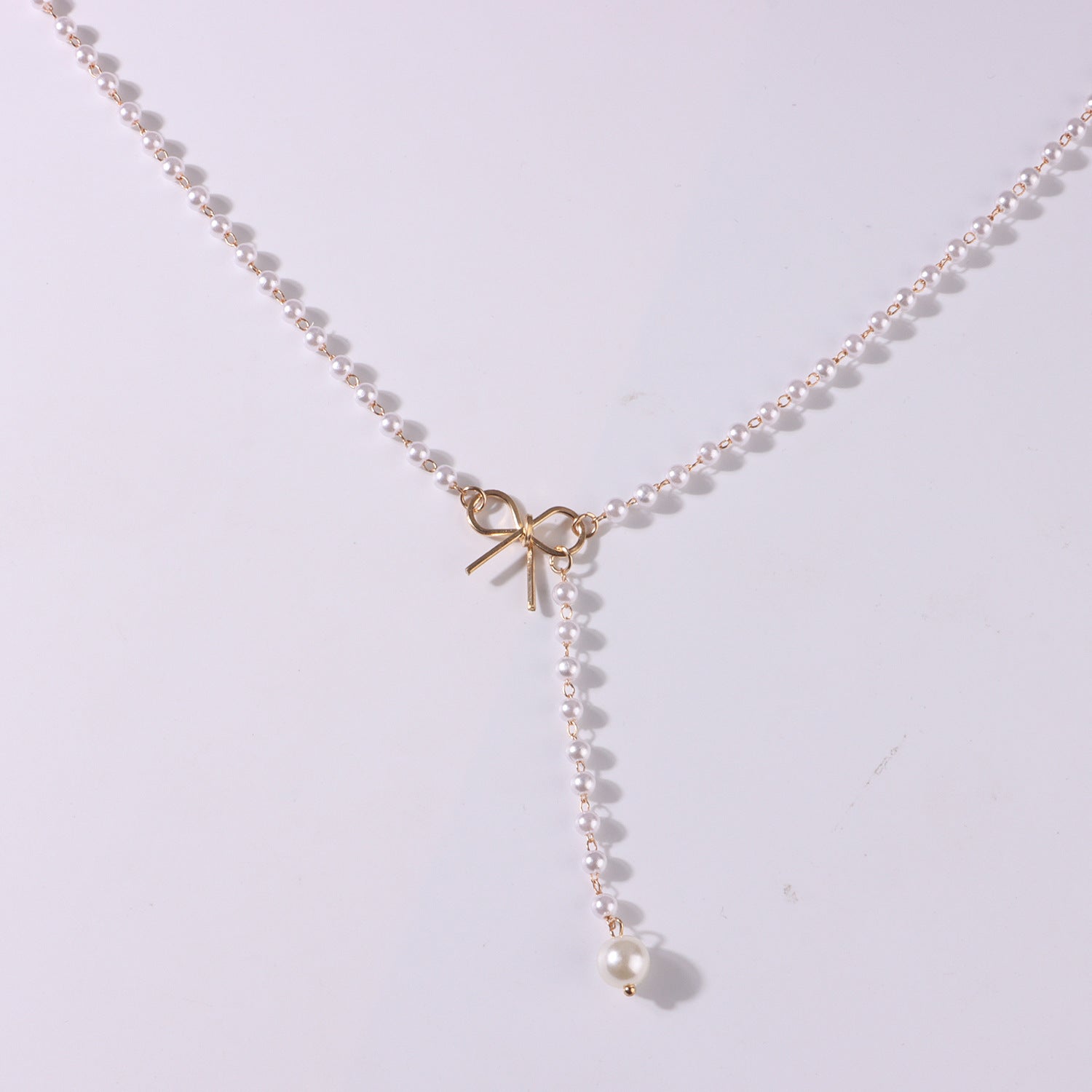 Wholesale  alloy bow Pearl tassel pendant necklace