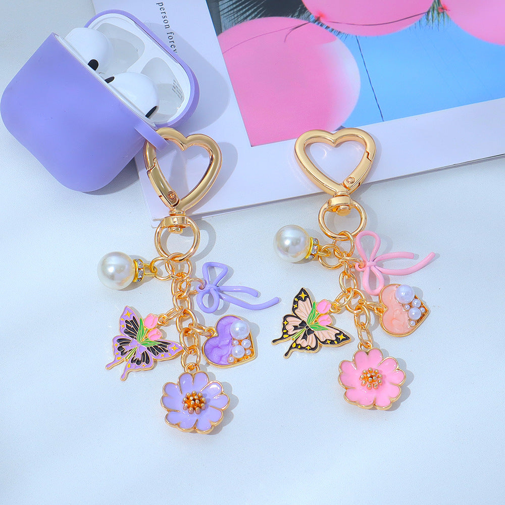 Wholesale Enamel Butterfly Flower Keychain with Pearl Pendant - Trendy Car Key Accessory