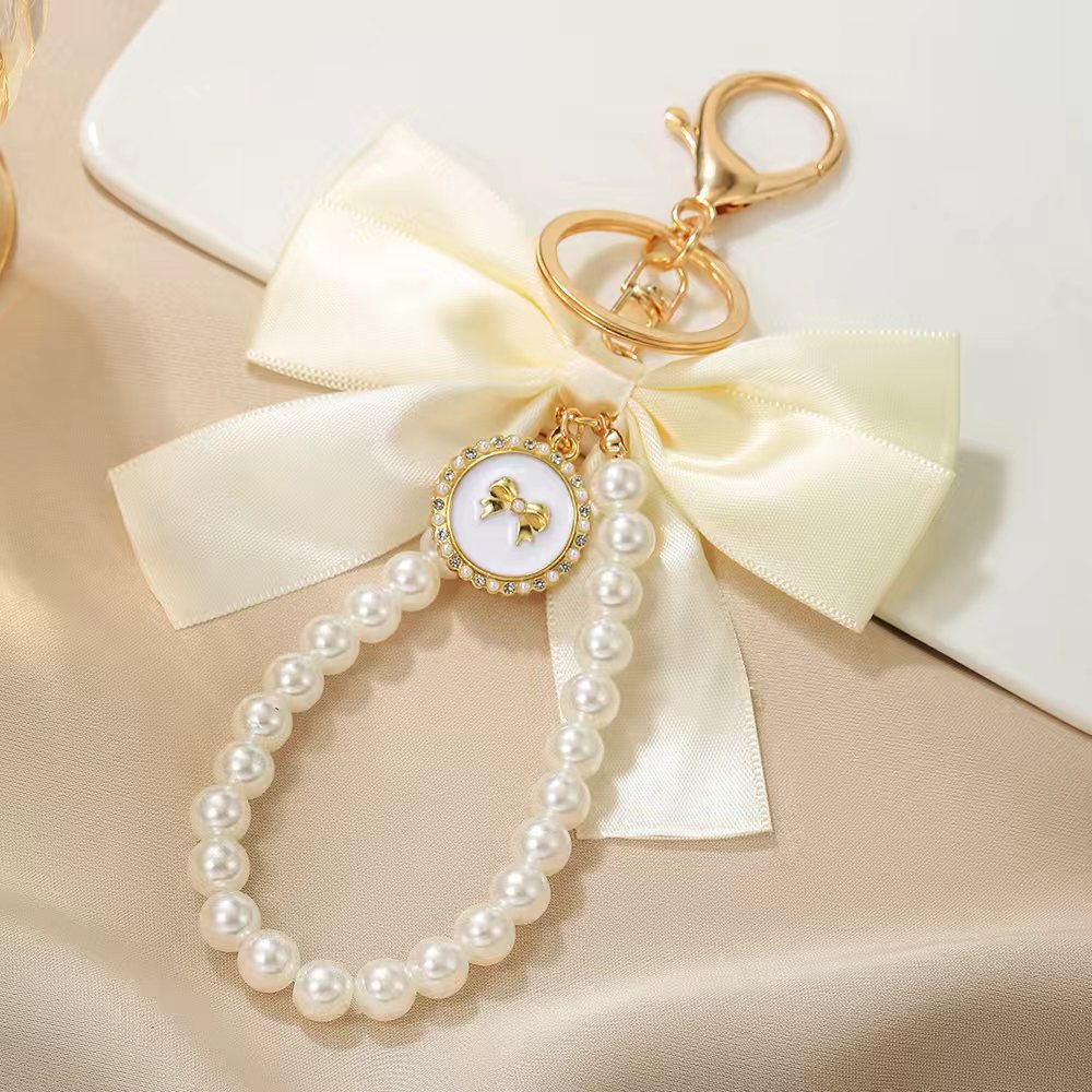 Wholesale Vintage Imitation Pearl Bow Keychain Pendant Alloy Car Key Accessory