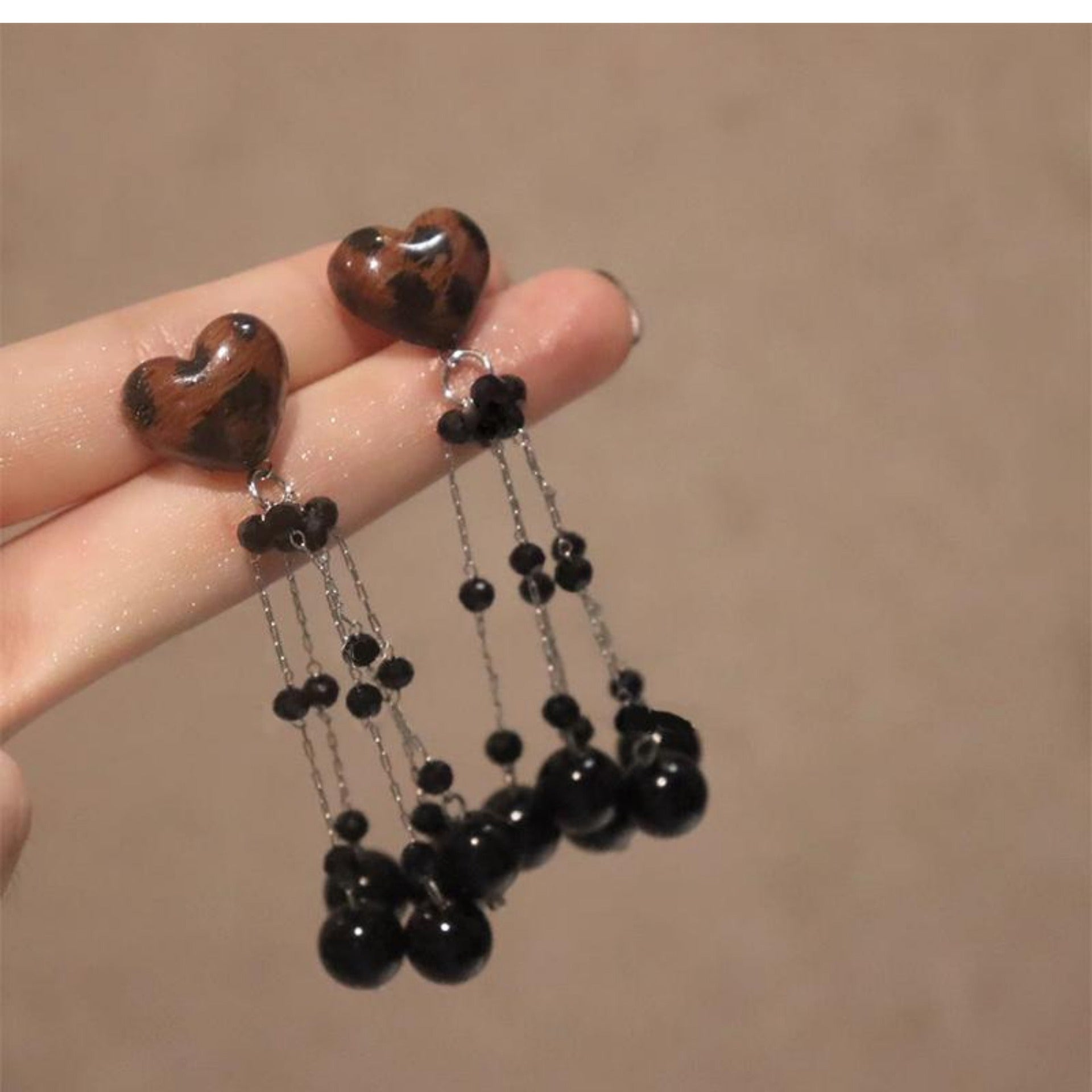 Wholesale black tassel long leopard print heart earrings