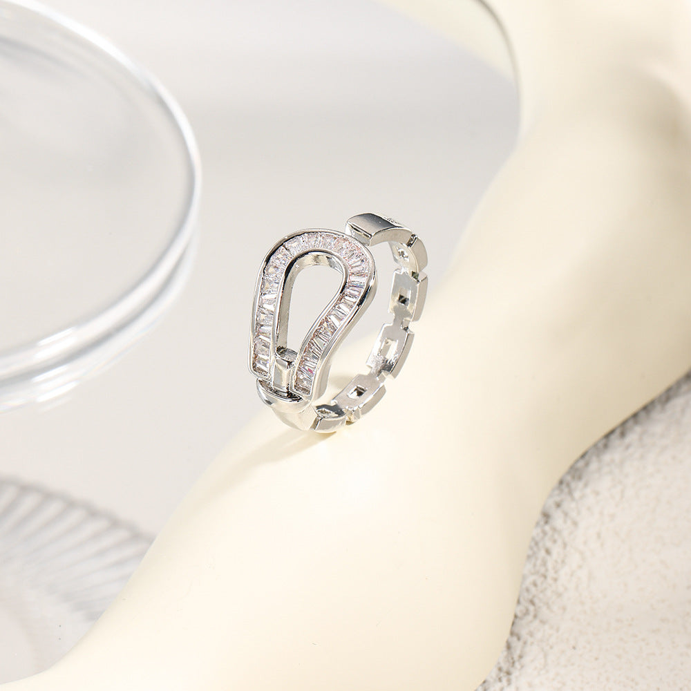 Wholesale Hollow inlaid stepped zircon horseshoe ring