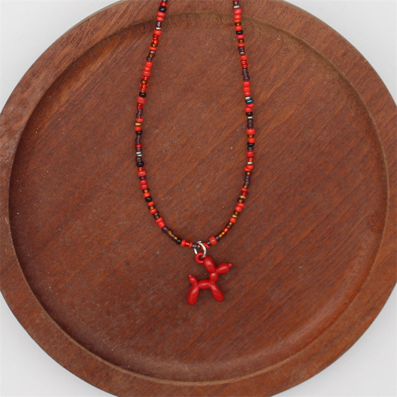 Wholesale cartoon puppy pendant macaron candy color  rice beads beaded necklace