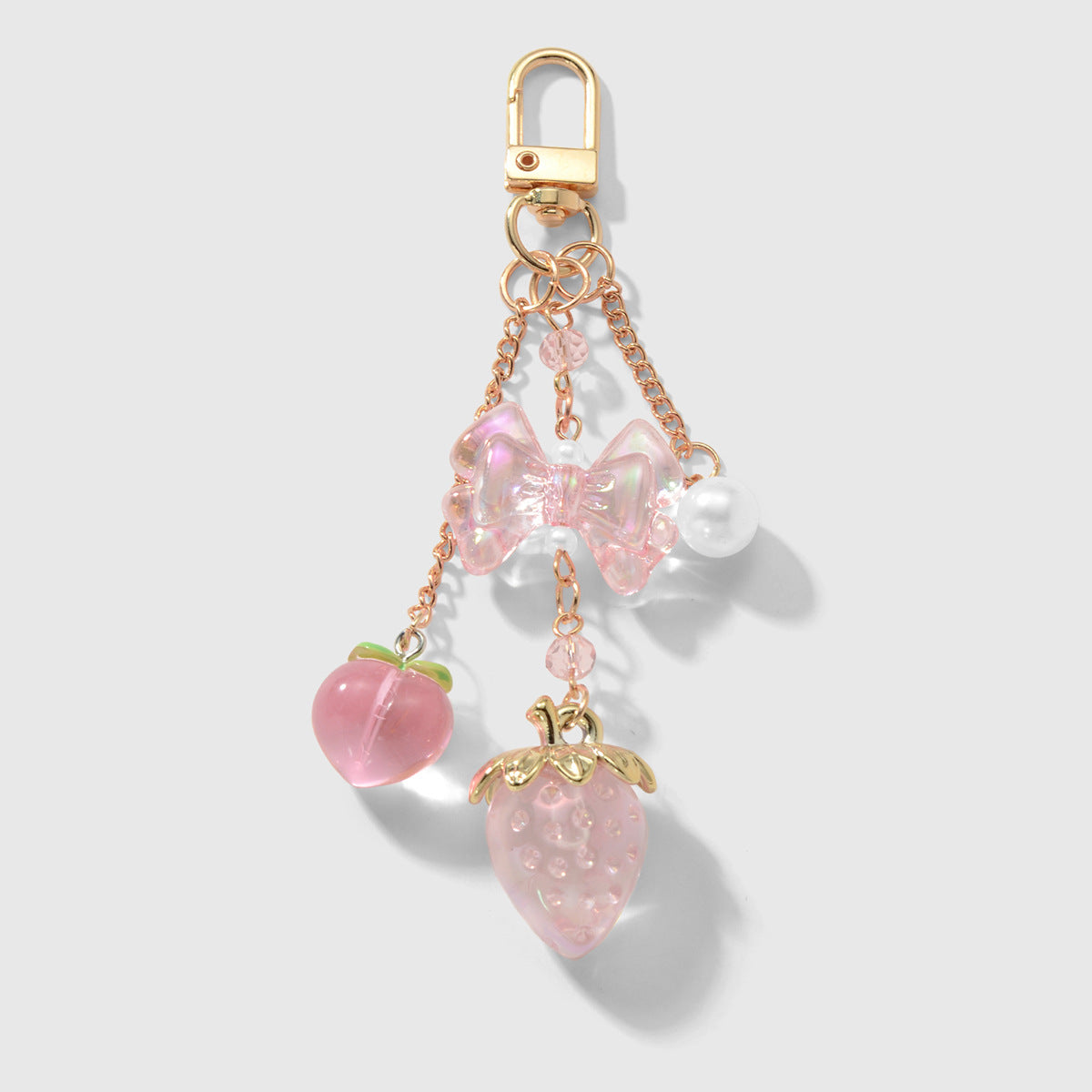 Wholesale Zinc alloy and resin butterfly knot strawberry keychain