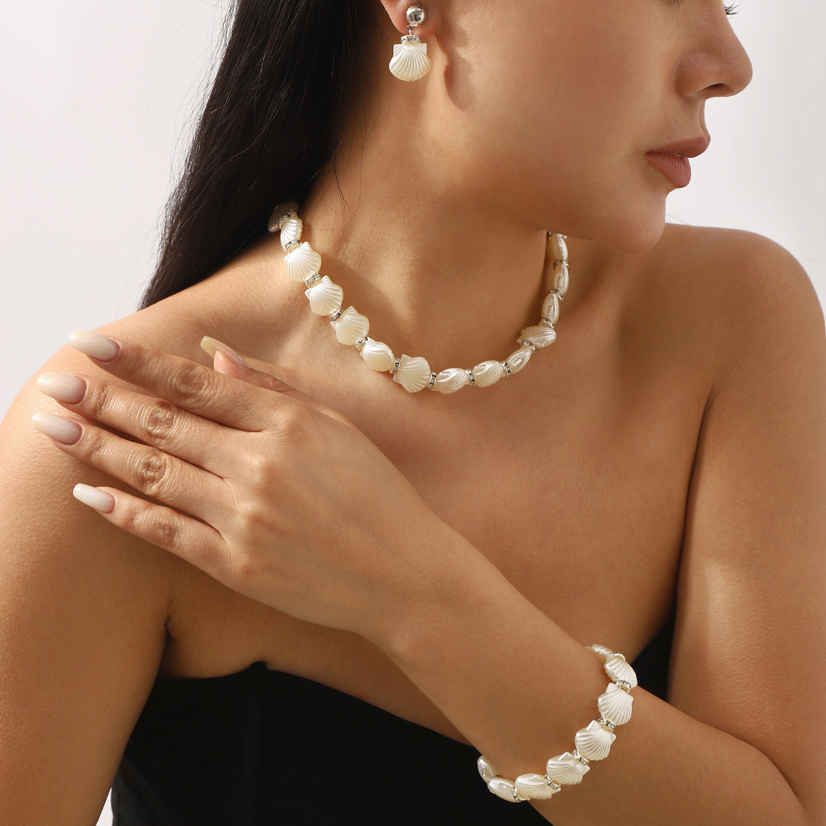 Wholesale Shell jewelry set with diamonds, resin earrings, necklaces and bracelets