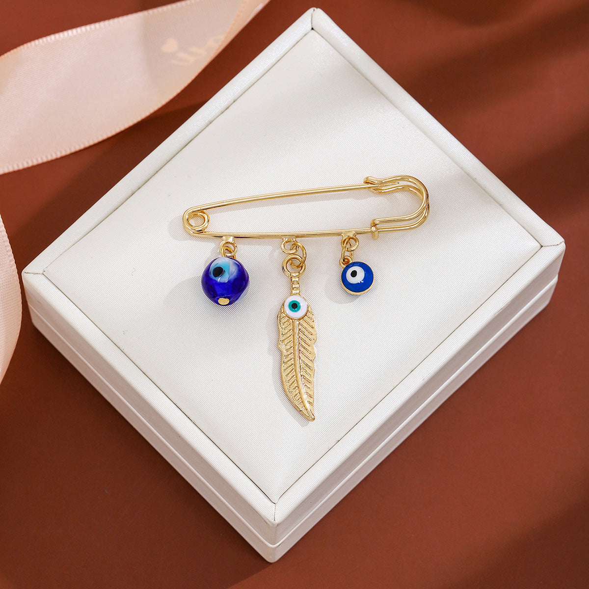 Wholesale Diamond-encrusted Devil' s Eye Tassel Brooch