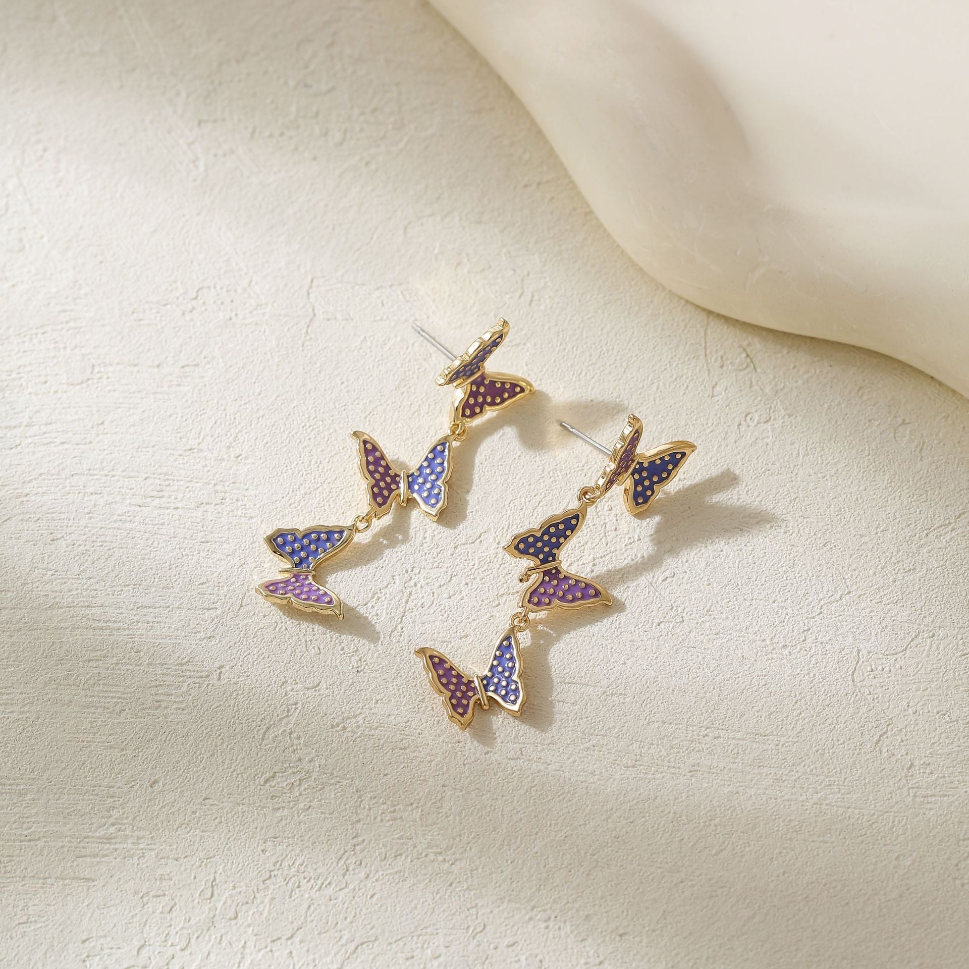 Wholesale Metal Bow Tassel Earrings