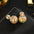 Wholesale light luxury double-sided hollow-out front and rear ball earrings