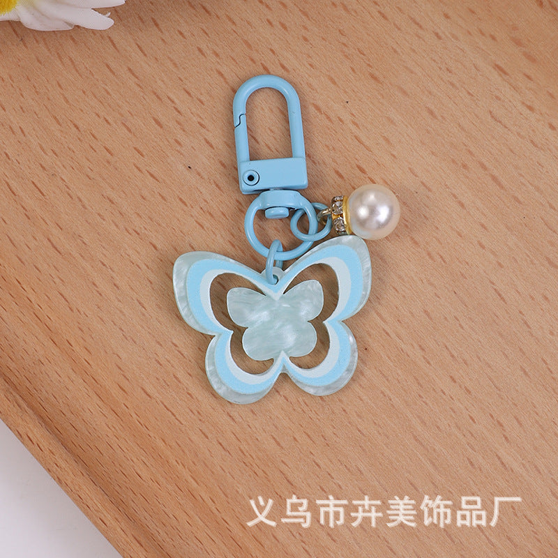 Wholesale Acrylic colorful hollow butterfly pearl pendant keychain