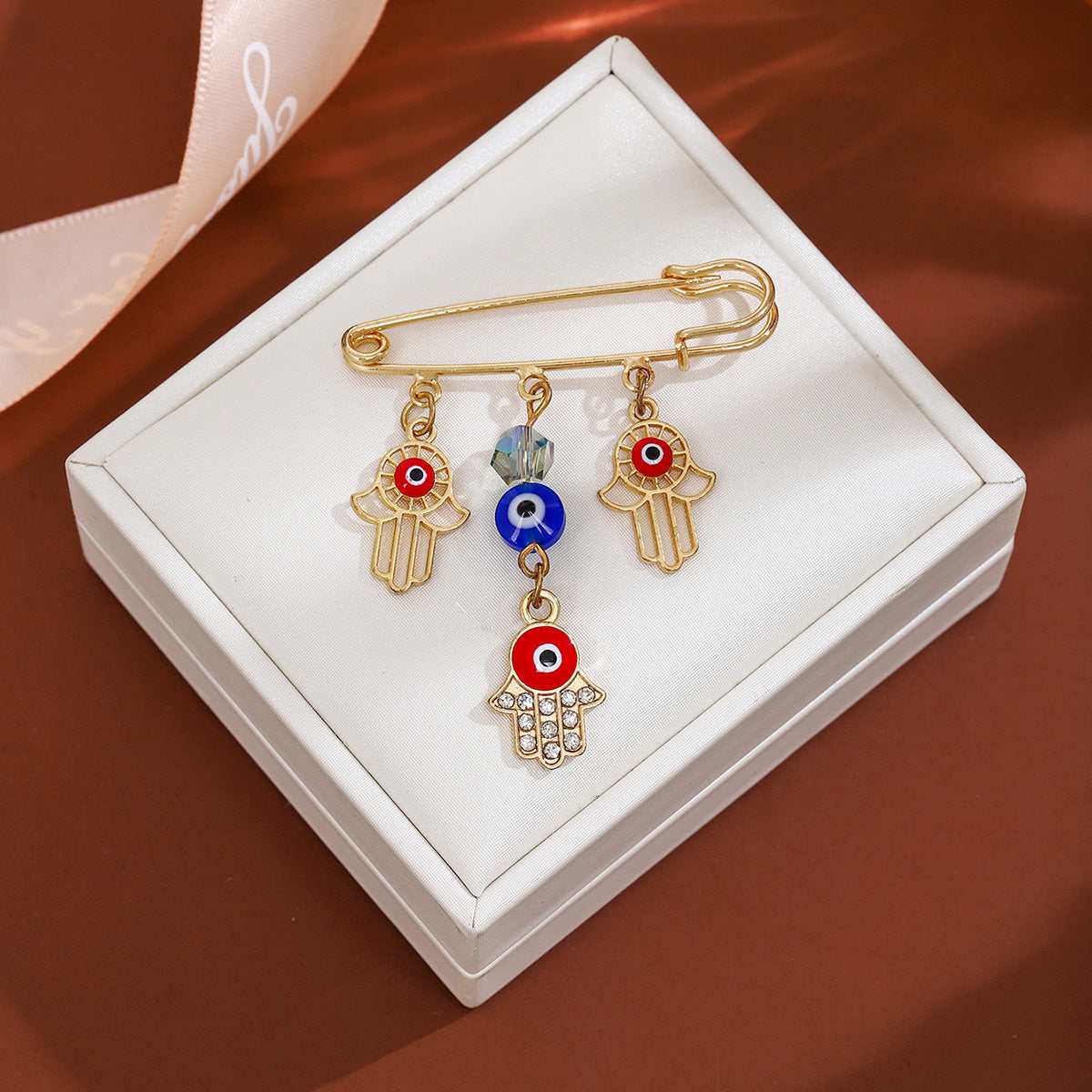 Wholesale Diamond-encrusted Devil' s Eye Tassel Brooch