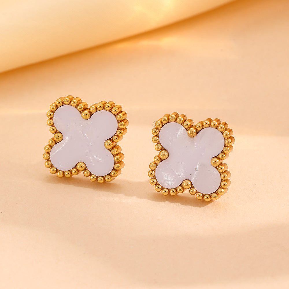 Wholesale Fashion stainless steel three four-leaf flower jewelry new titanium steel does not fade small flower jewelry suit