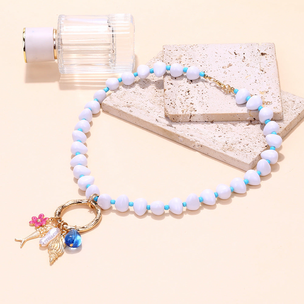 Wholesale Spliced Irregular Pearl Tropical Fish Conch Flower Pendant Necklace