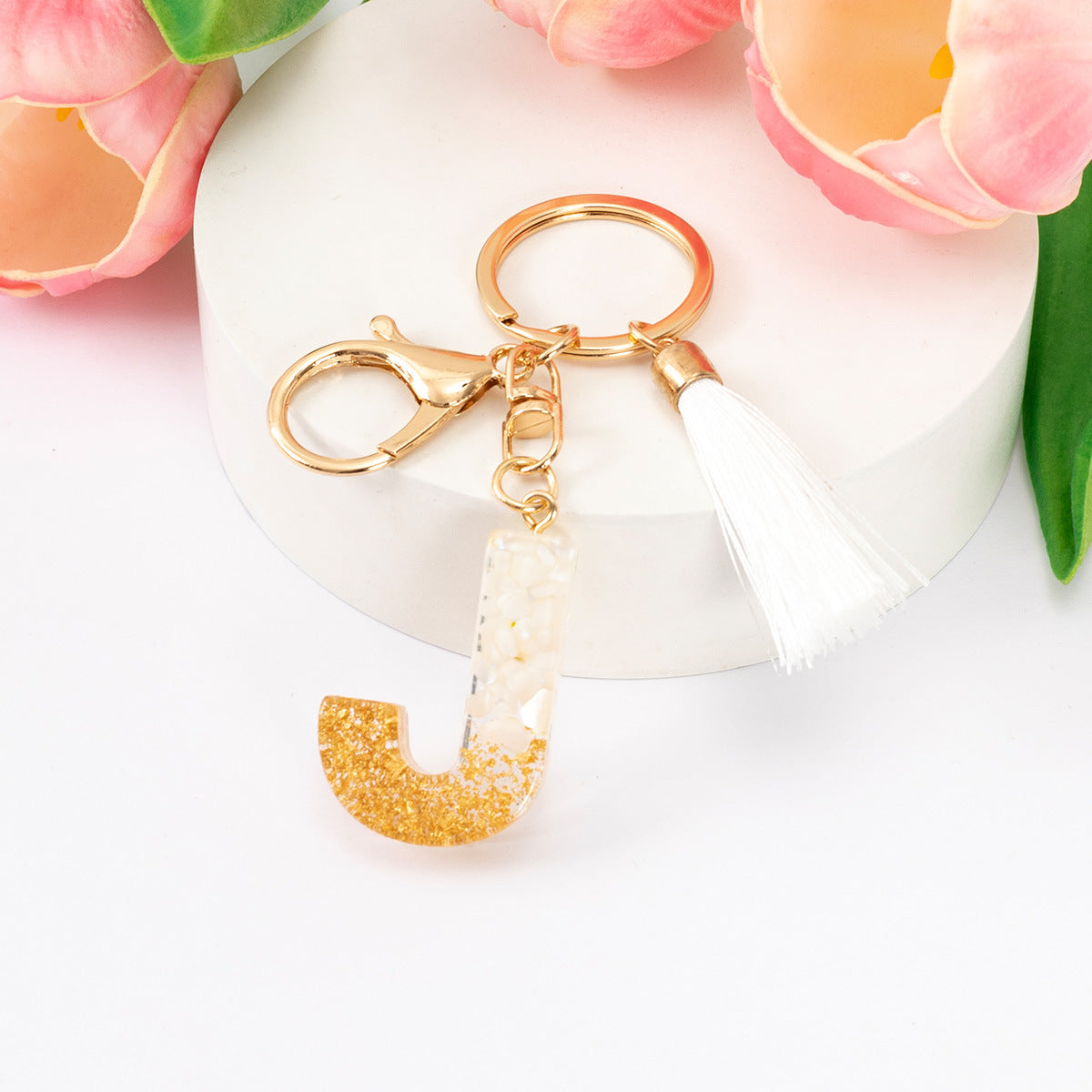 Wholesale Gold Foil New Resin Crystal Glue White Tassel Color English Digital Keychain