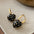 Wholesale light luxury black heart earrings