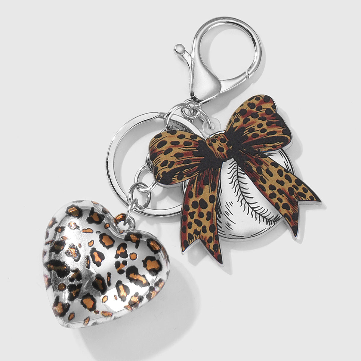 Wholesale Zinc alloy leopard print bowknot heart-shaped earphone case keychain