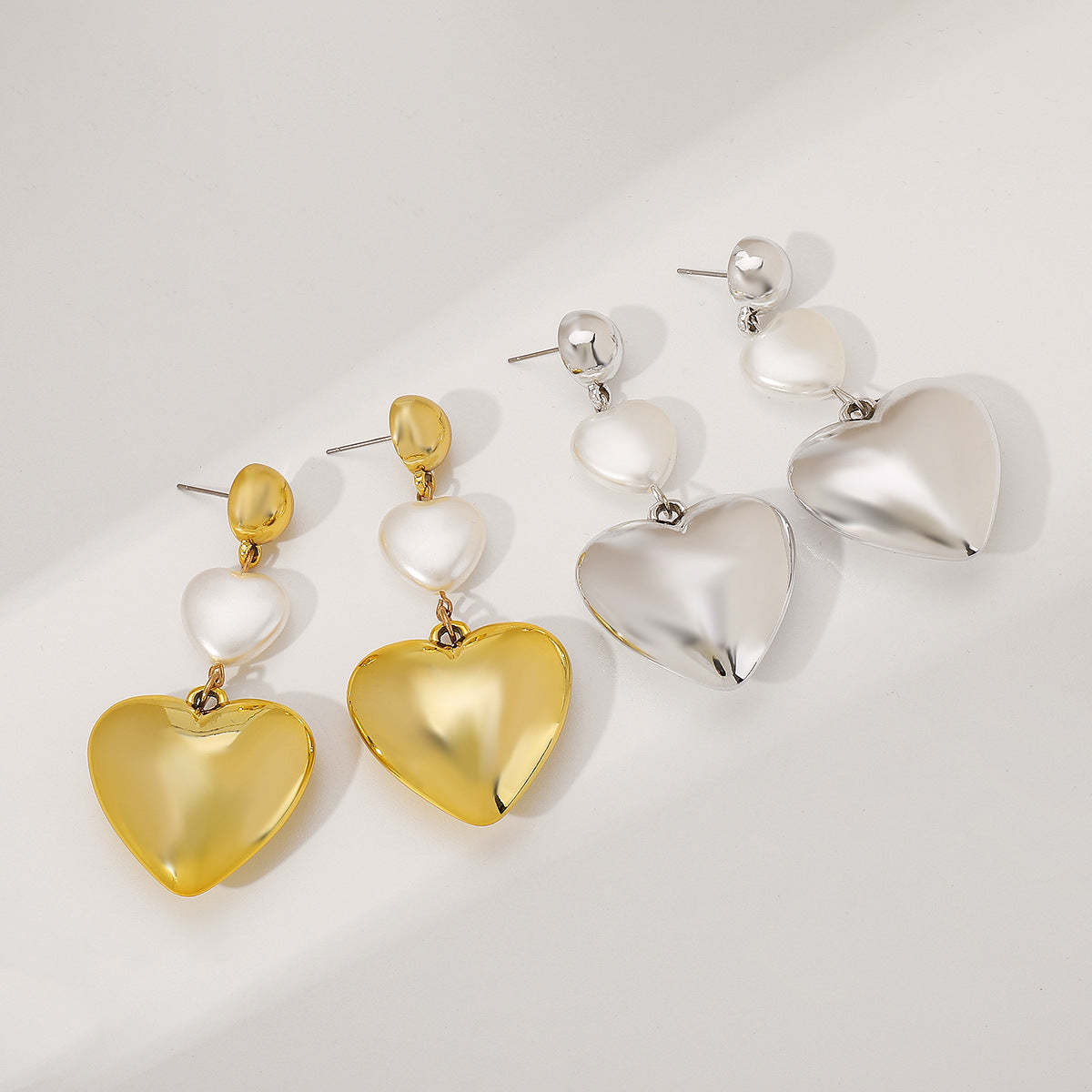 Wholesale  metal love imitation pearl earrings niche design luxury high sense earrings temperament earrings