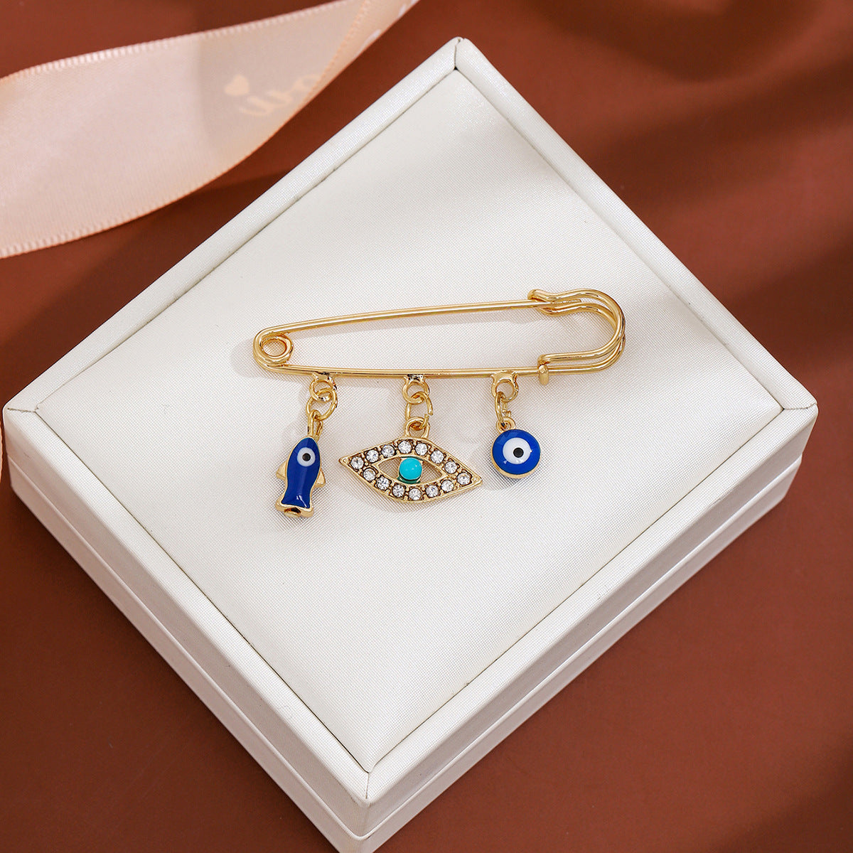 Wholesale Diamond-encrusted Devil' s Eye Tassel Brooch