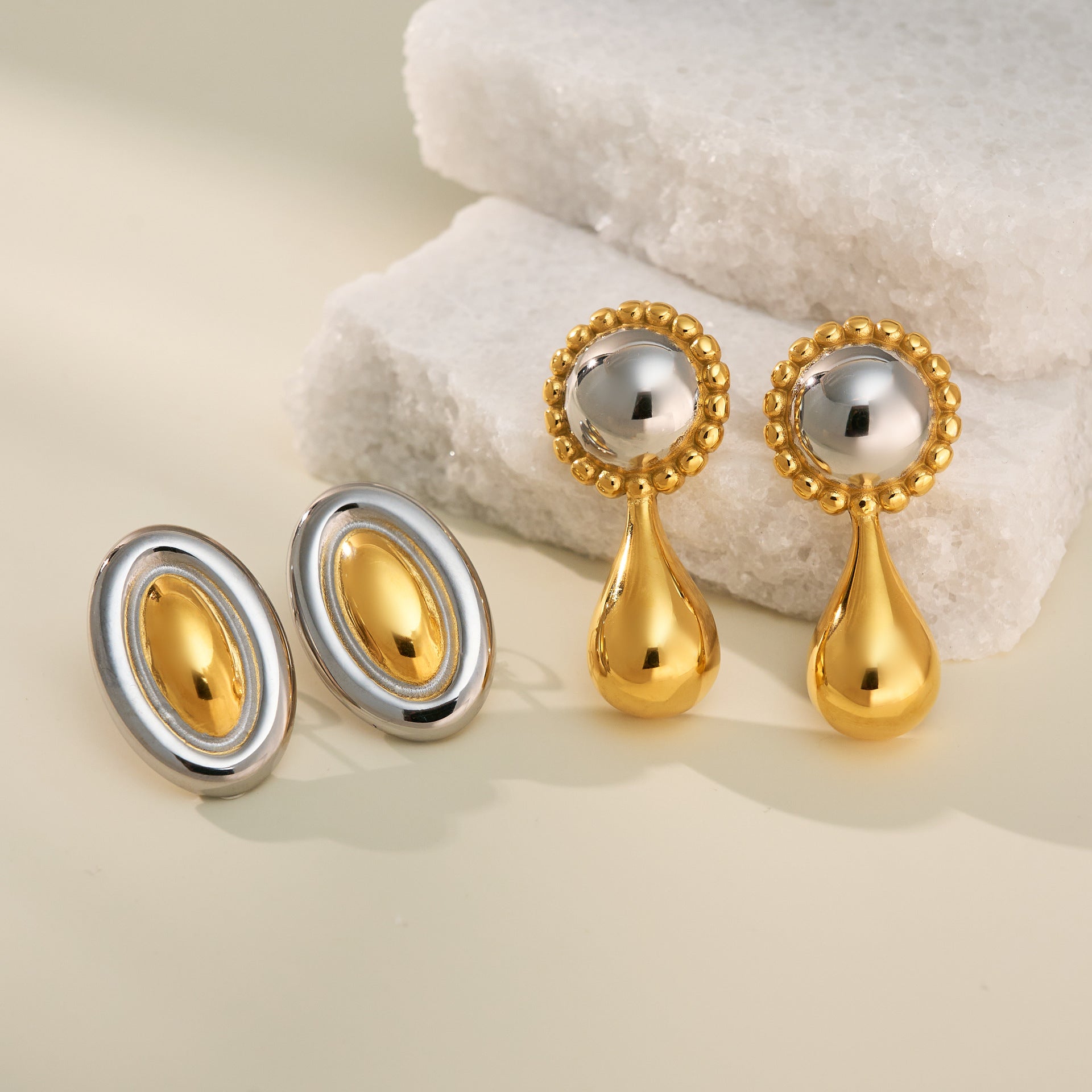 Wholesale  18k real gold electroplated titanium steel gold and silver cat's eye earrings