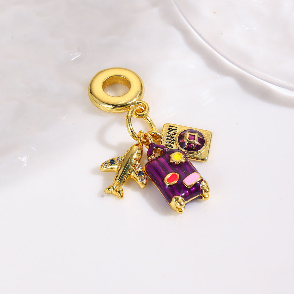 Wholesale Copper oil drop grape cola suitcase camera earphone three-piece pendant set