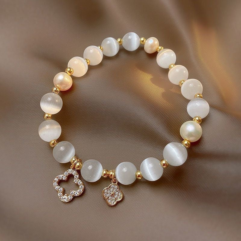 Wholesale Four Leaf Clover Imitation Cat S Eye Glass Pearl Bracelet Women S Everyday Wear Boutique Resale Jewelry Accessory