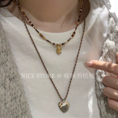 Wholesale brown woven heart letter puppy necklace